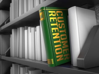 Customer Retention - Green Book on the Black Bookshelf between white ones..jpeg