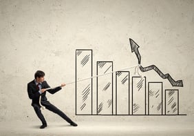 Image of young businessman pulling graph. Chart growth concept-1.jpeg
